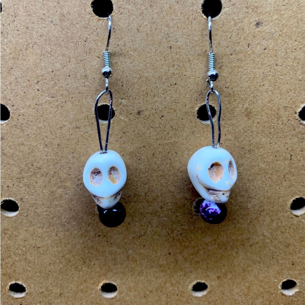 Handmade Skull Earrings. Skulls made of Wagnerite stone.